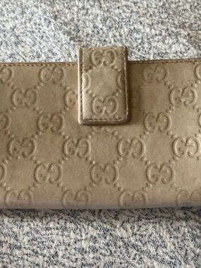 Gucci Taupe Embossed GG Leather Wallet